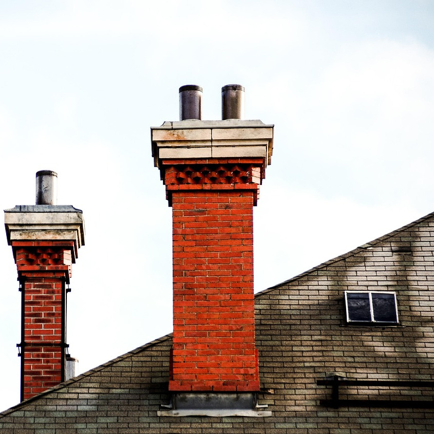 chimney sweep on roof